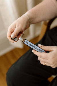 canadian tuxedo perfume roller